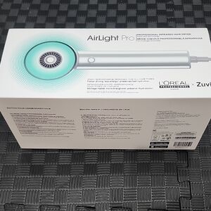 L'Oreal AirLight Pro Hair Dryer in Silver and White